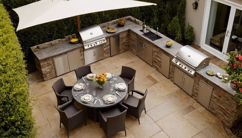 L-shape outdoor kitchen with stone veneer